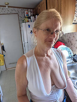 pulling saggy titty granny nude